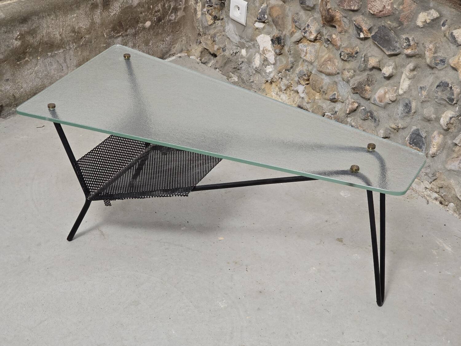 Coffee table in glass and black lacquered metal