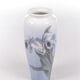 Royal Copenhagen Porcelain Vase painted with the trumpet flower.