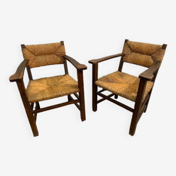 Pair of wooden armchairs with mulch