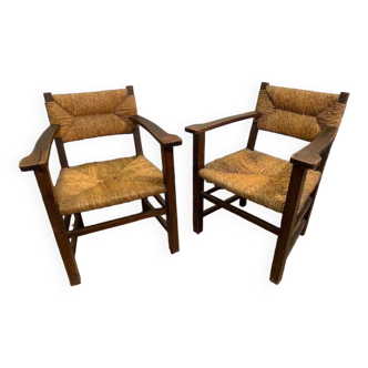 Pair of wooden armchairs with mulch