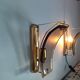 Pair of brass and curved glass wall lamps from the 80s