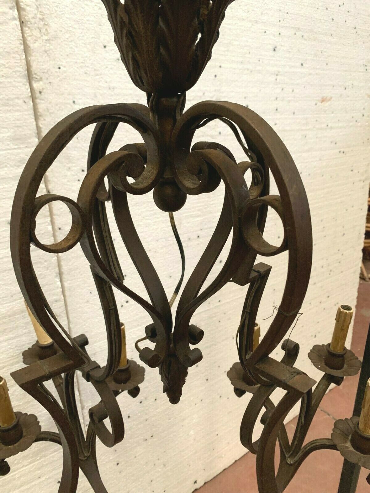 Louis xv style wrought iron chandelier twelve points of light xx century