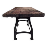 Industrial dining table with cast iron base