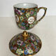 Porcelain covered cup