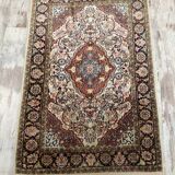 Tapis persan fait main en laine et soie