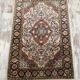Handmade Persian wool and silk rug