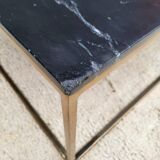Coffee table or black marble and brass display "in its own juice"