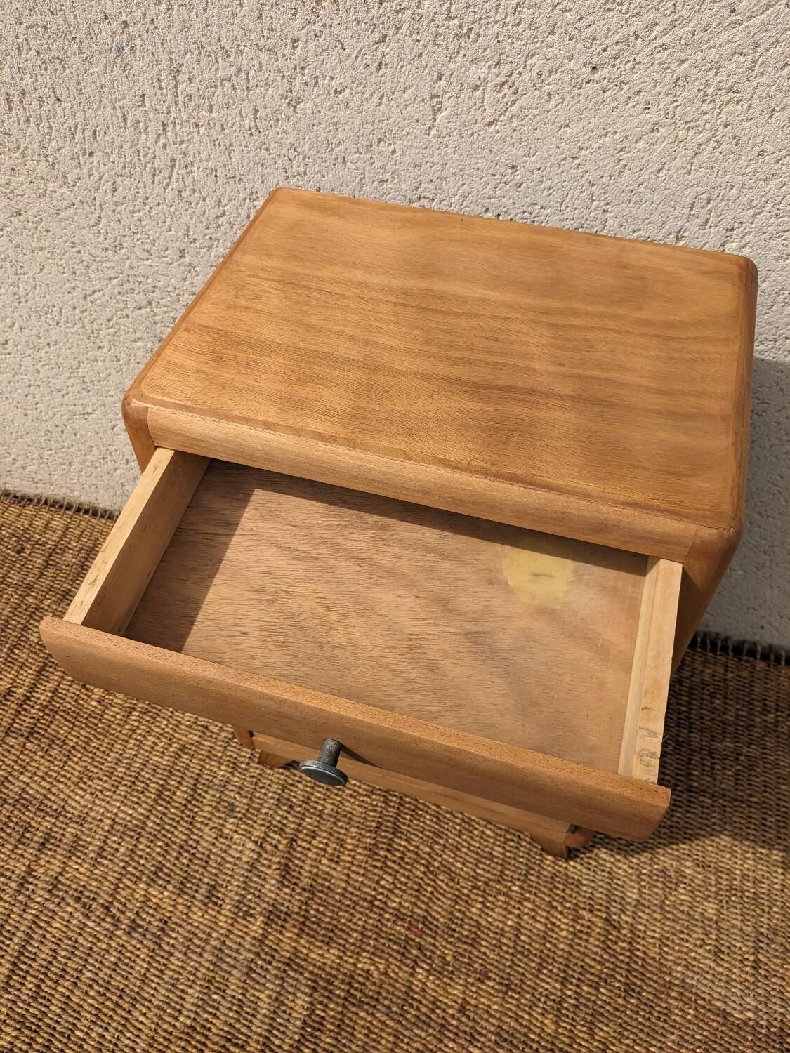 Vintage bedside table with compass legs