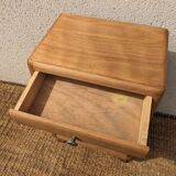 Vintage bedside table with compass legs