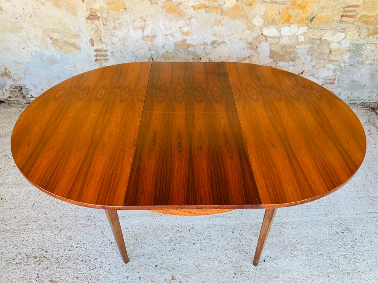 Extendable dining table with butterfly extensions in rosewood circa 60's