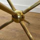 Round tripod designer coffee table in brass