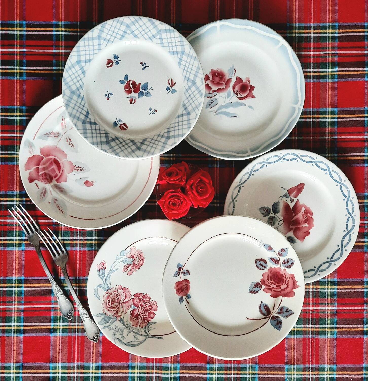 Mismatched antique flat plates in earthenware accompanied by a deep dish.