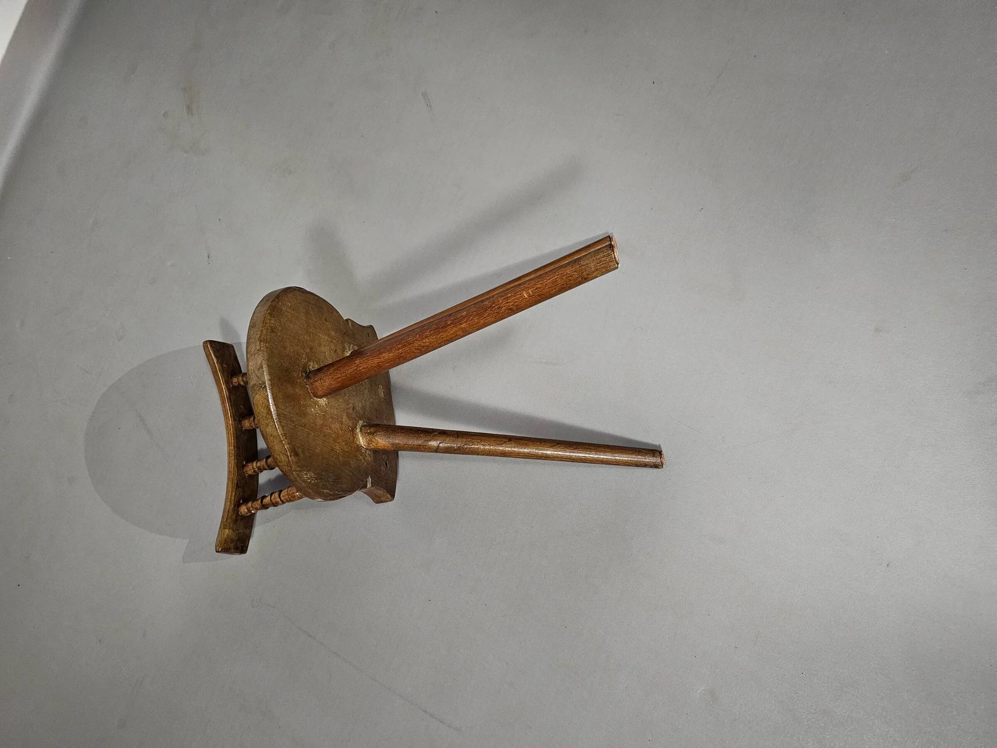 Old farmers tripod chair for decorative use