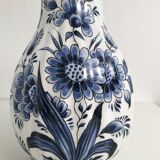 Vase with vintage blue and white flower pattern signed