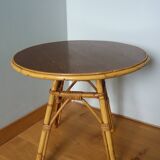 Round coffee table in wicker and bamboo
