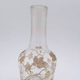 Old crystal carafe with golden decoration