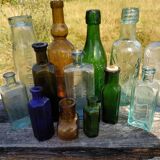 Set of old bottles colored glass