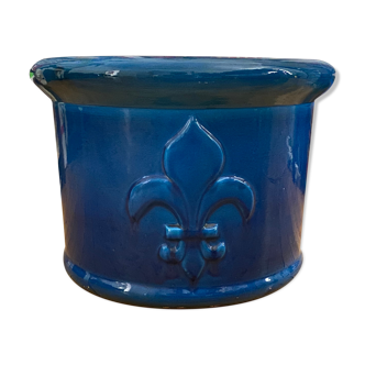 Blue pot cover with fleur-de-lis