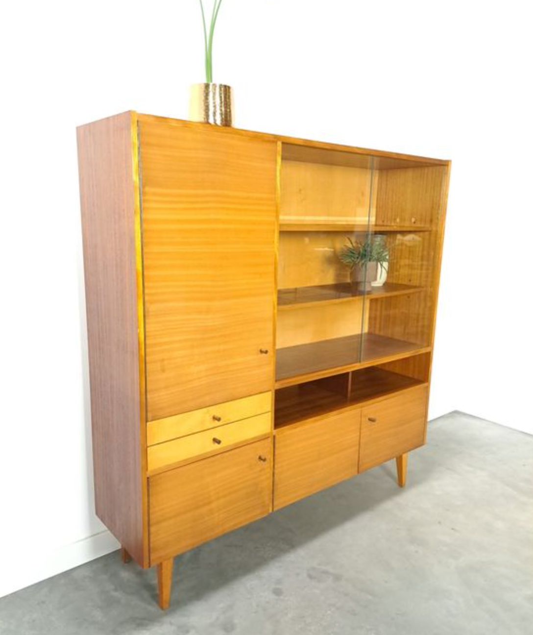 Vintage wooden sideboard with sliding glass doors and drawers