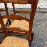 4 Louis XV chairs in solid oak with rush seats, shell carvings, 19th century.