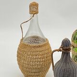 Trio bottles / lady Jeanne, dressed in wicker, rattan, natural fibers