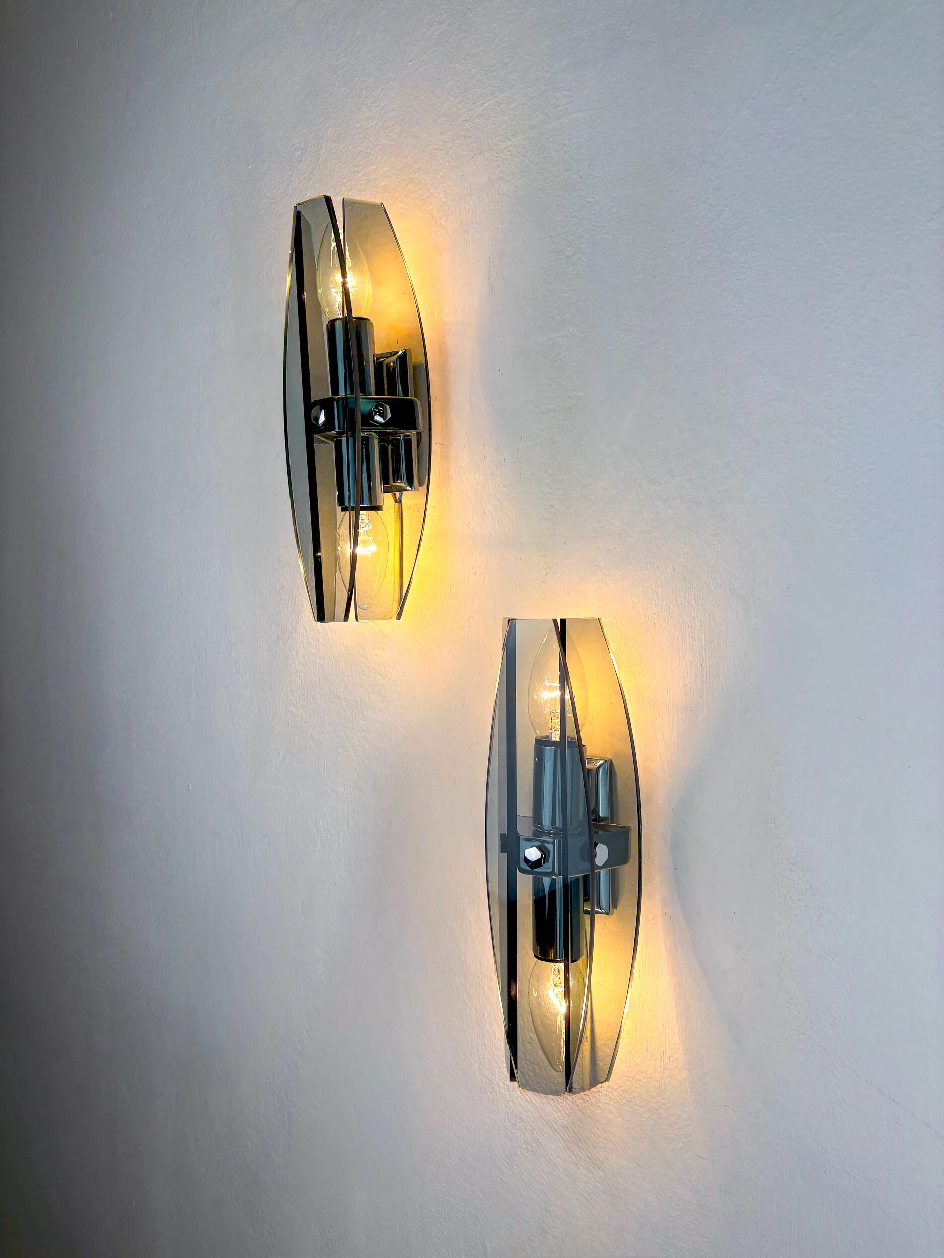 Pair of Veca wall sconces, black Murano glass, Italy, 1970s
