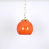 Orange glass pendant light by Peill Putzler, Germany, 1970.