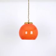 Orange glass pendant light by Peill Putzler, Germany, 1970.