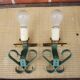 2 old wall lights in brass and painted wrought iron