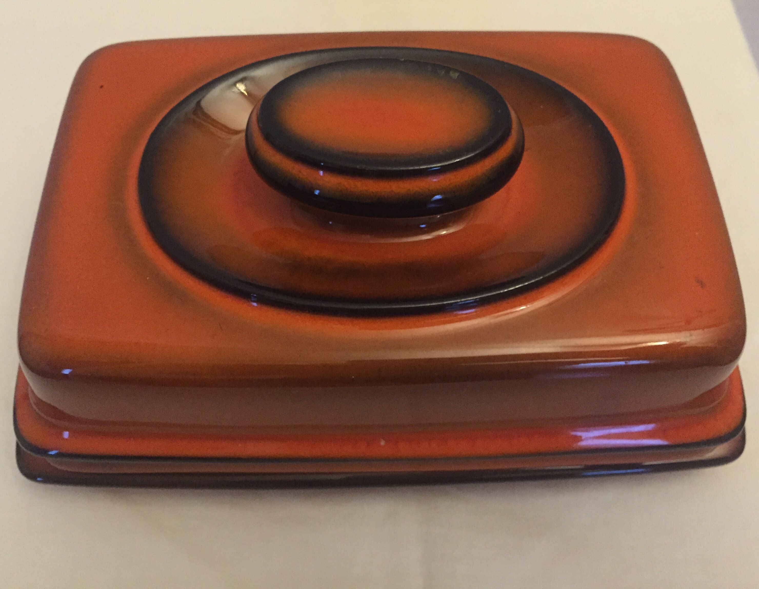 Red ceramic butter dish