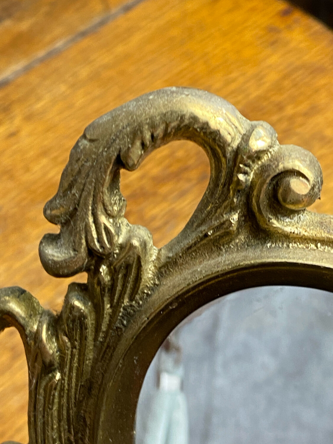 Small antique bronze mirror