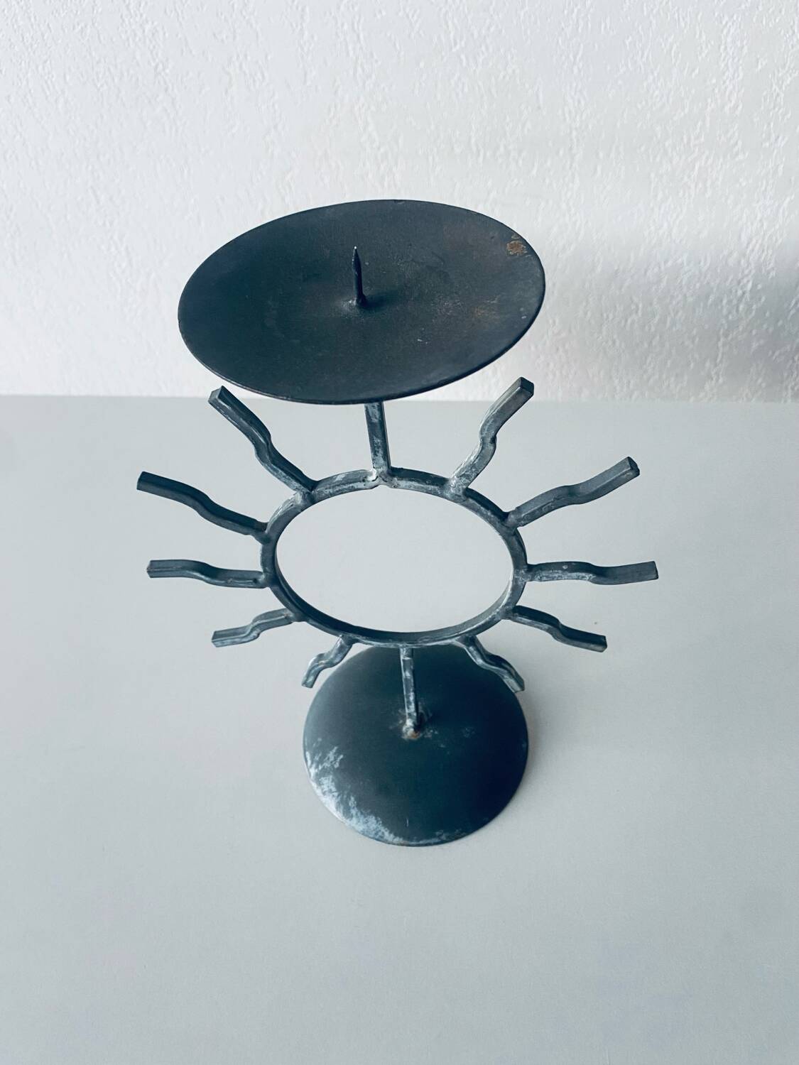Iron sun candle holder