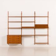 Danish teak wall unit in the style of Cadovius, Sorensen with a lamp, 1970s