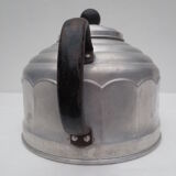 old aluminum kettle with a sufffloating system