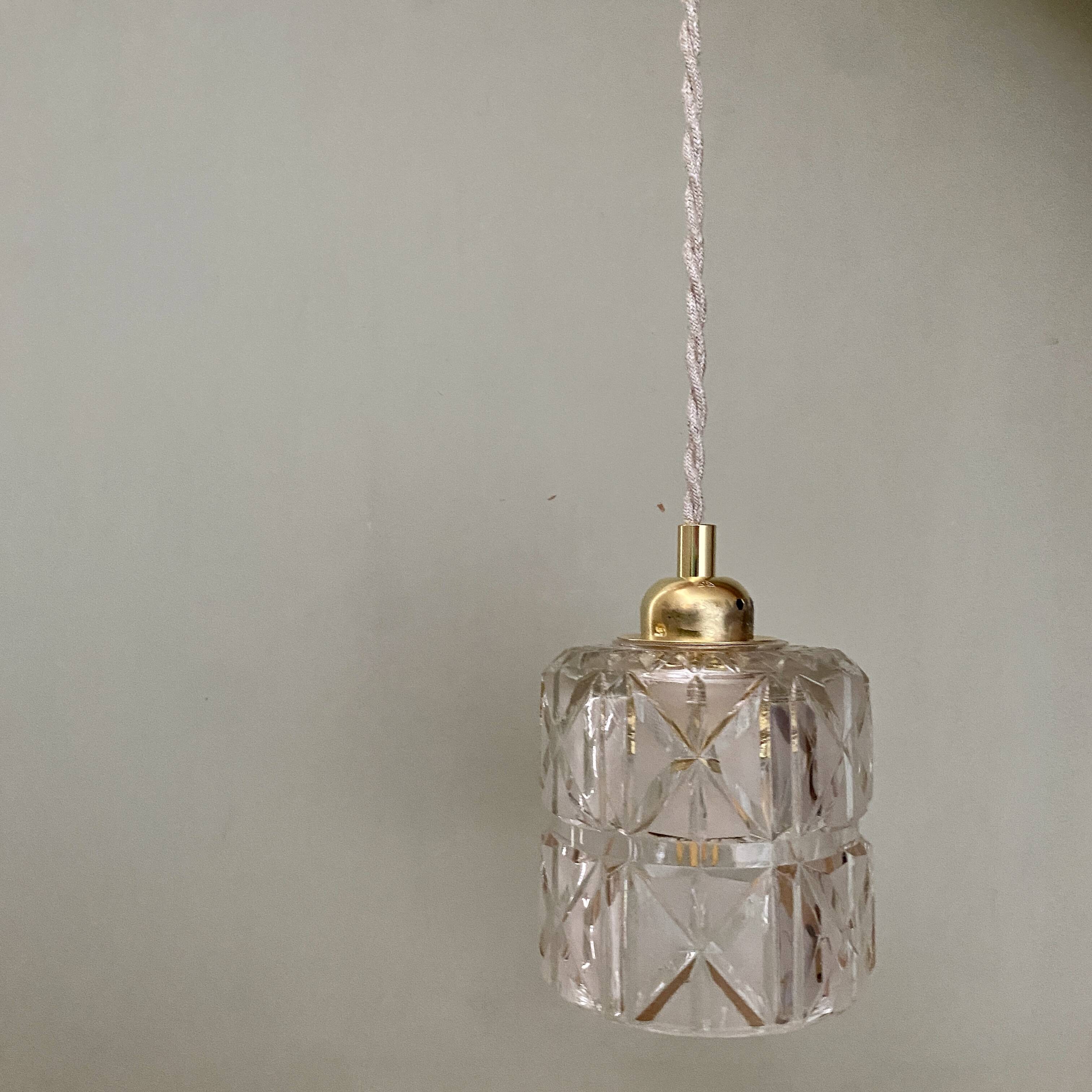 Vintage globe pendant light in thick, chiseled and frosted glass