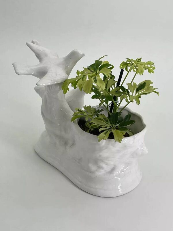 Cache pot vintage de colombes en porcelaine blanc