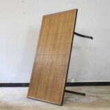 Dining table in rattan and wrought iron similar to Audoux & Minet.