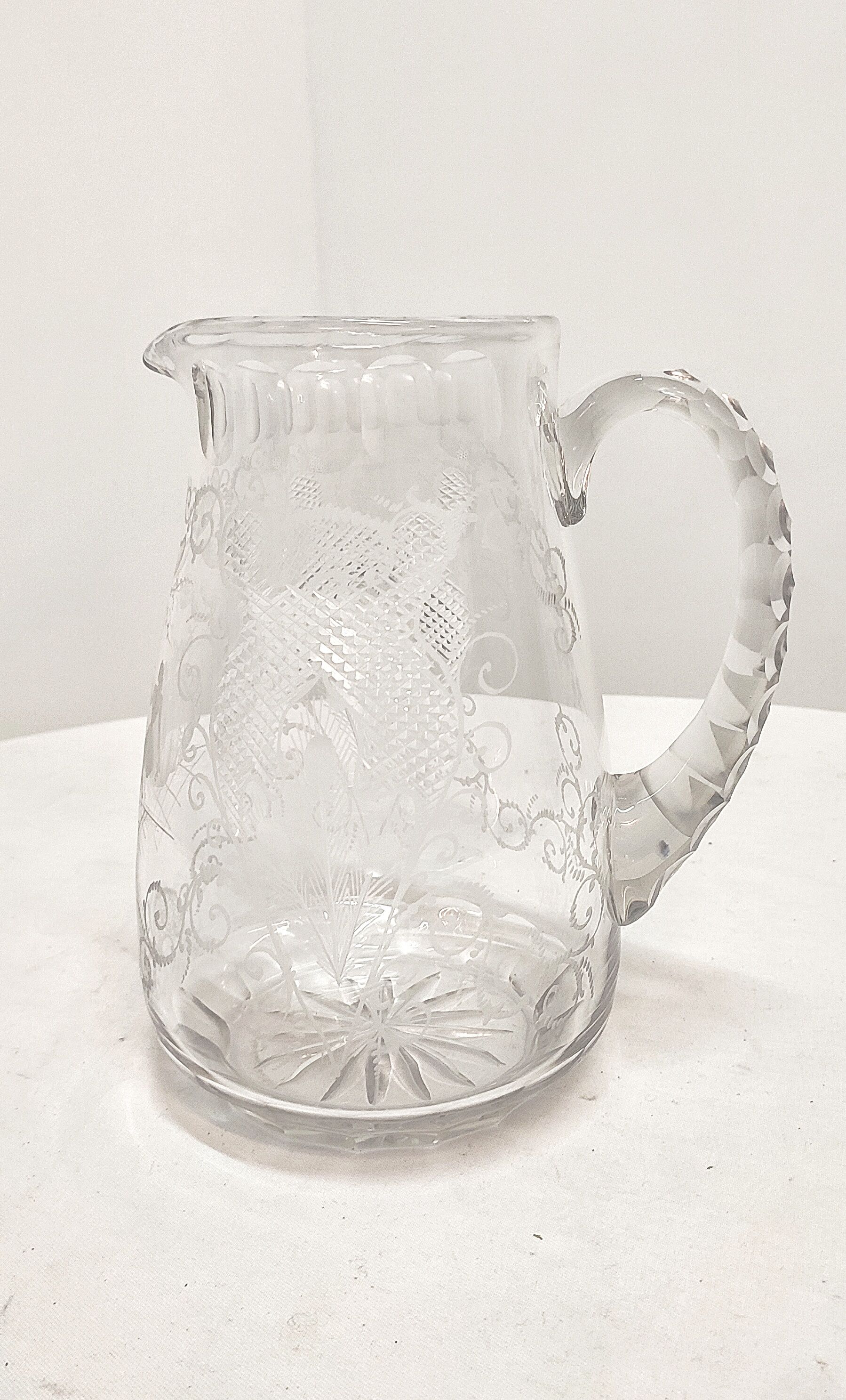Hand-carved glass jug. France, 1950s.