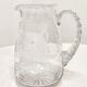 Hand-carved glass jug. France, 1950s.