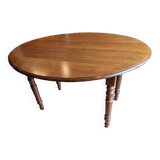 Beautiful oval wooden table with turned wooden leg with 3 extensions