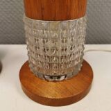 Swedish table lamps made of teak wood and hard pressed crystal glass.