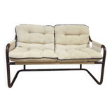 Tubular two-seater bench from the 1970s.