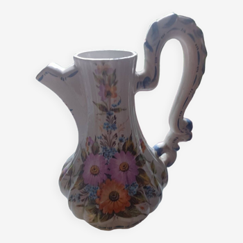 Earthenware carafe with floral motifs