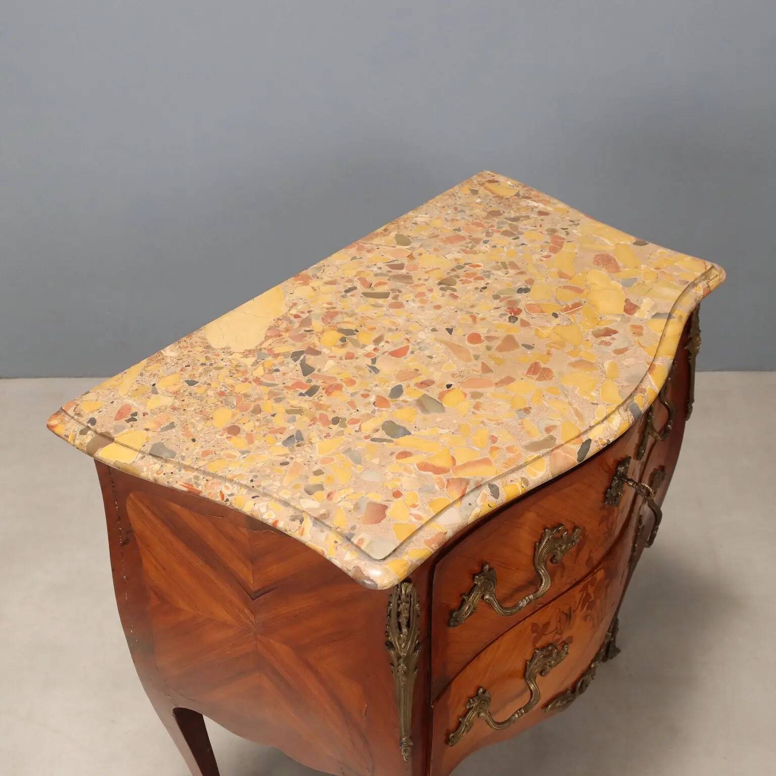 Antique commode in Baroque style made of mahogany, 20th century.