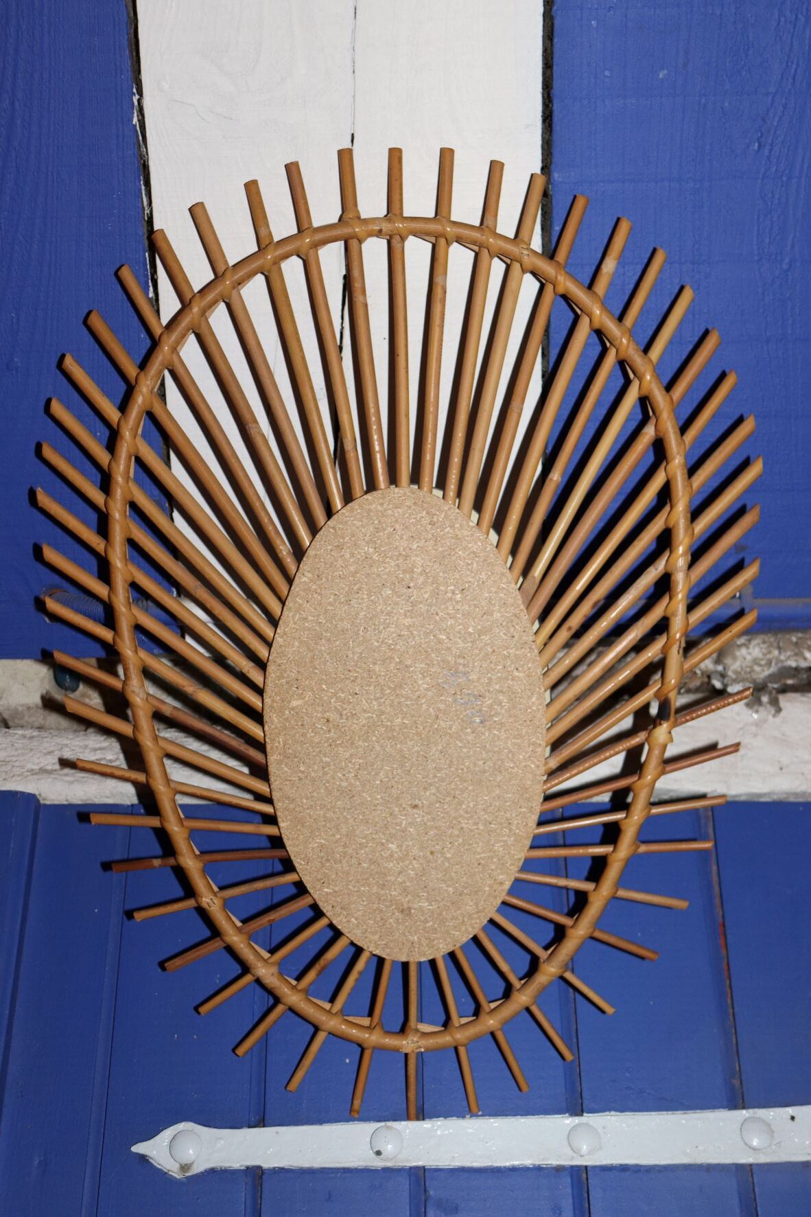 Oval rattan mirror