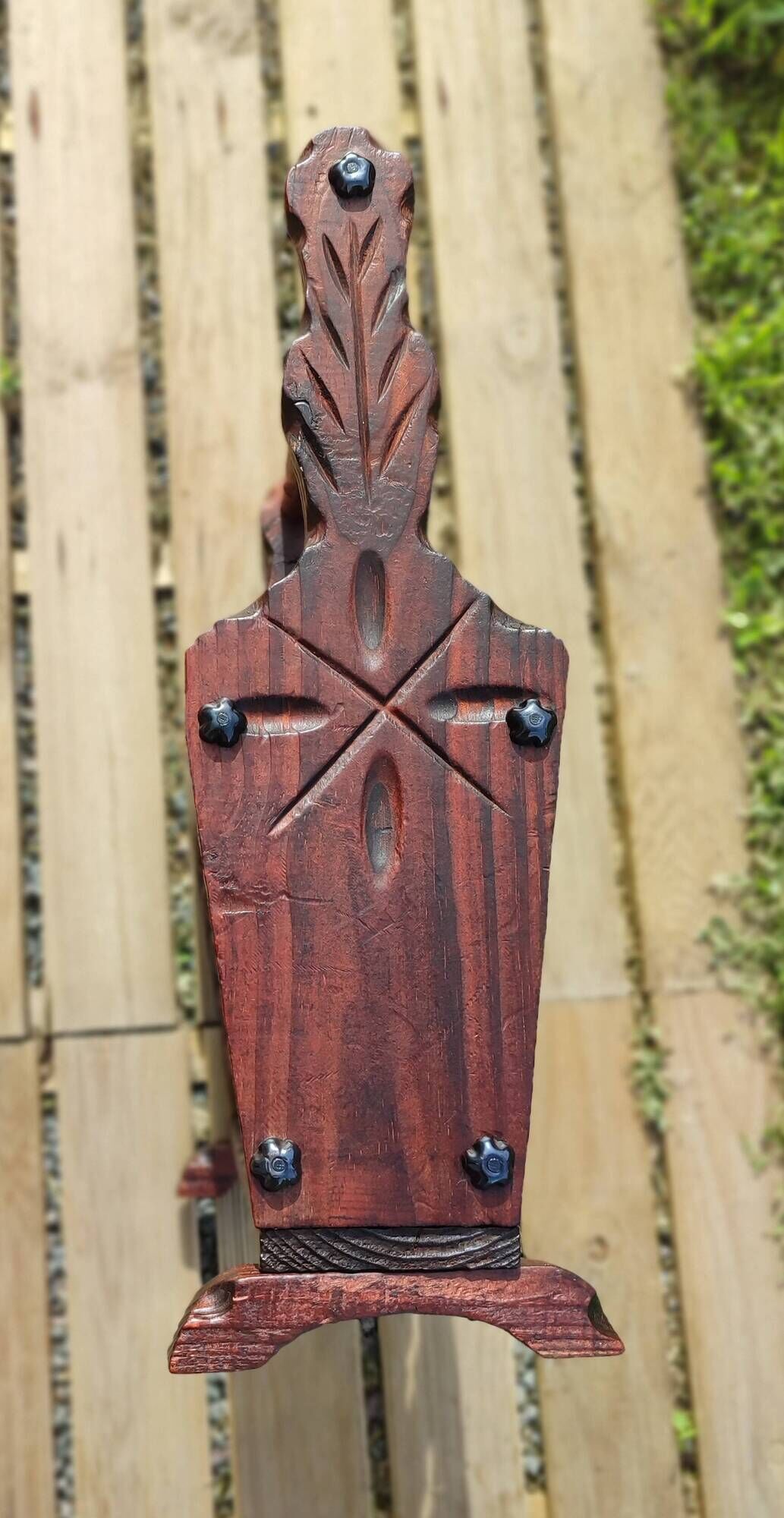 Rustic stained wooden magazine rack
