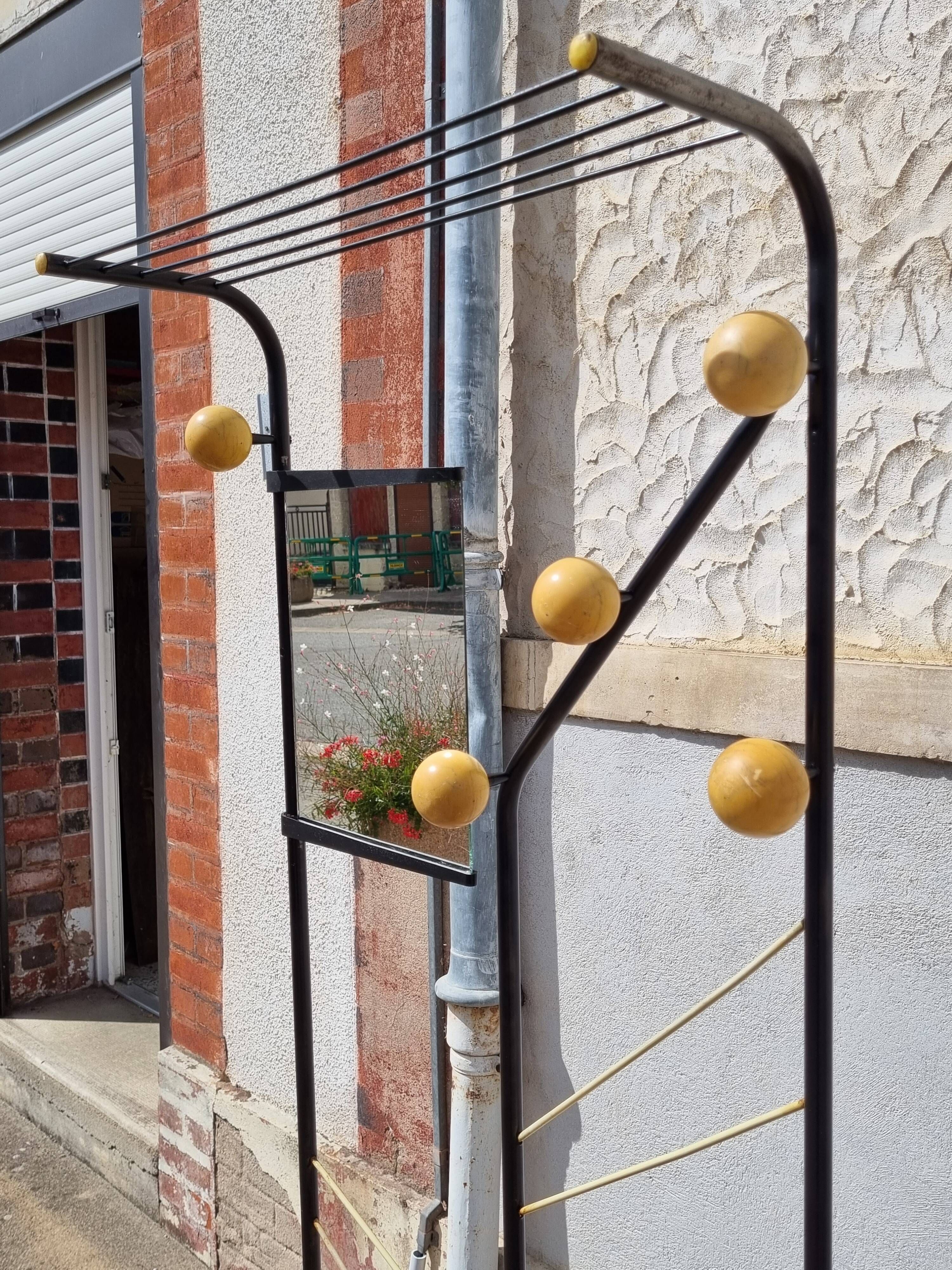 Postmodern entrance wardrobe from the 1980s in black metal and Bakelite, 180 cm.