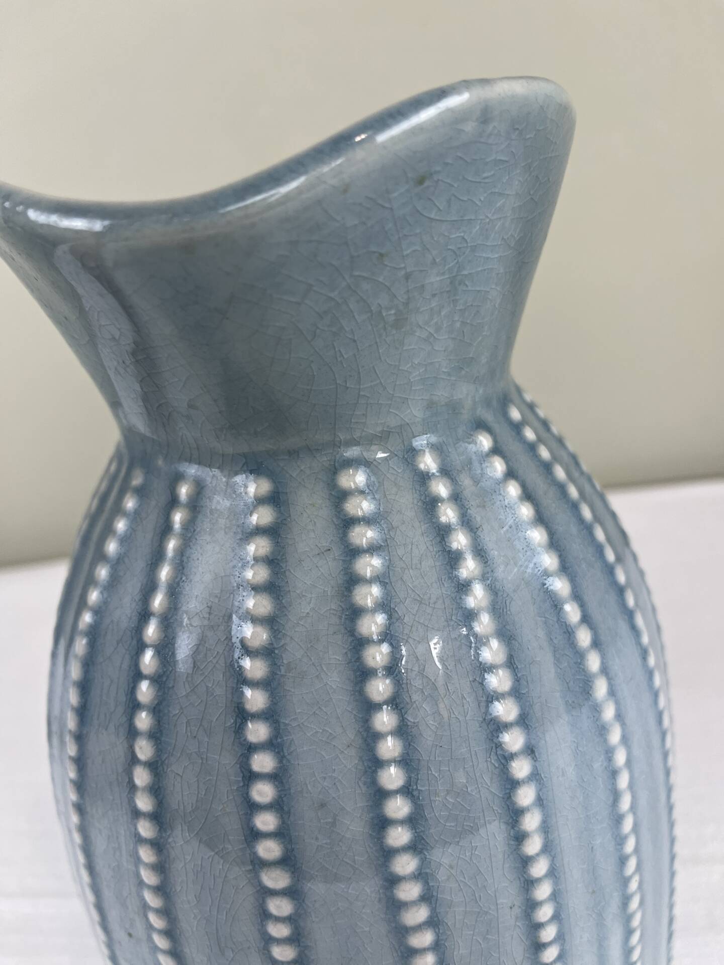 Large vintage pitcher in crackled celadon ceramic, beaded decoration.