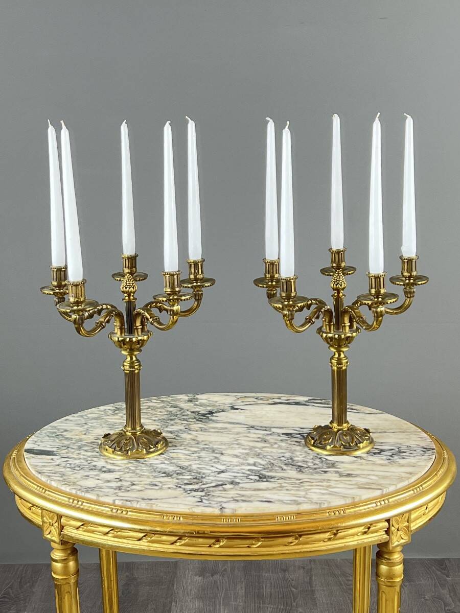 Pair of gilded bronze candelabra with 5 lights, Louis XVI style, 20th century.