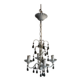 Antique white lacquered metal chandelier with wooden pendants.